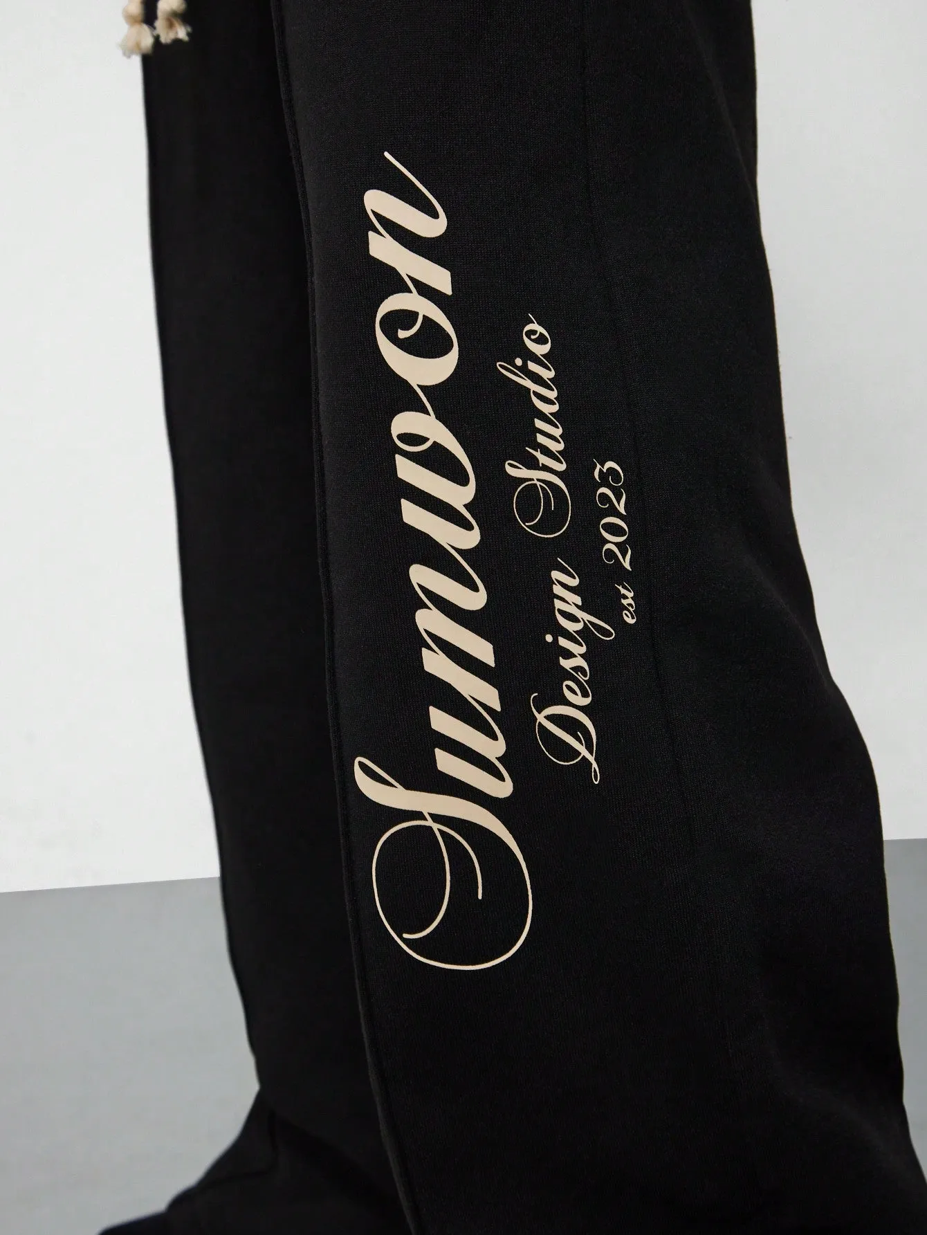 SUMWON WOMEN Straight Fit Sweatpants With Pintucks & Side Slit Leg Print Graphic