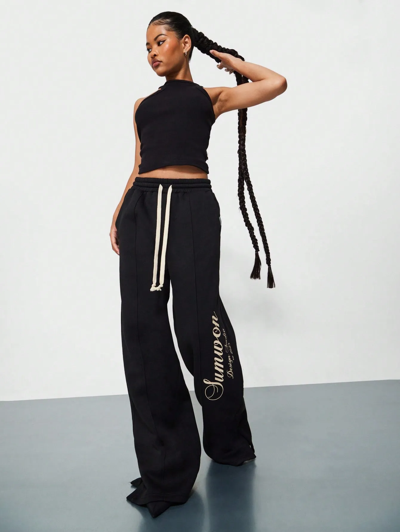 SUMWON WOMEN Straight Fit Sweatpants With Pintucks & Side Slit Leg Print Graphic