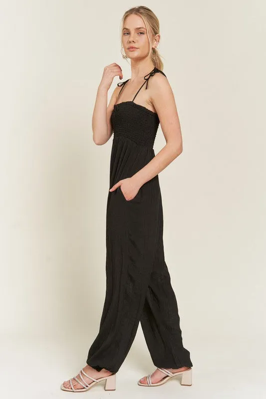 TEEK - SMOCKED SHOULDER TIE STRAP JUMPSUIT