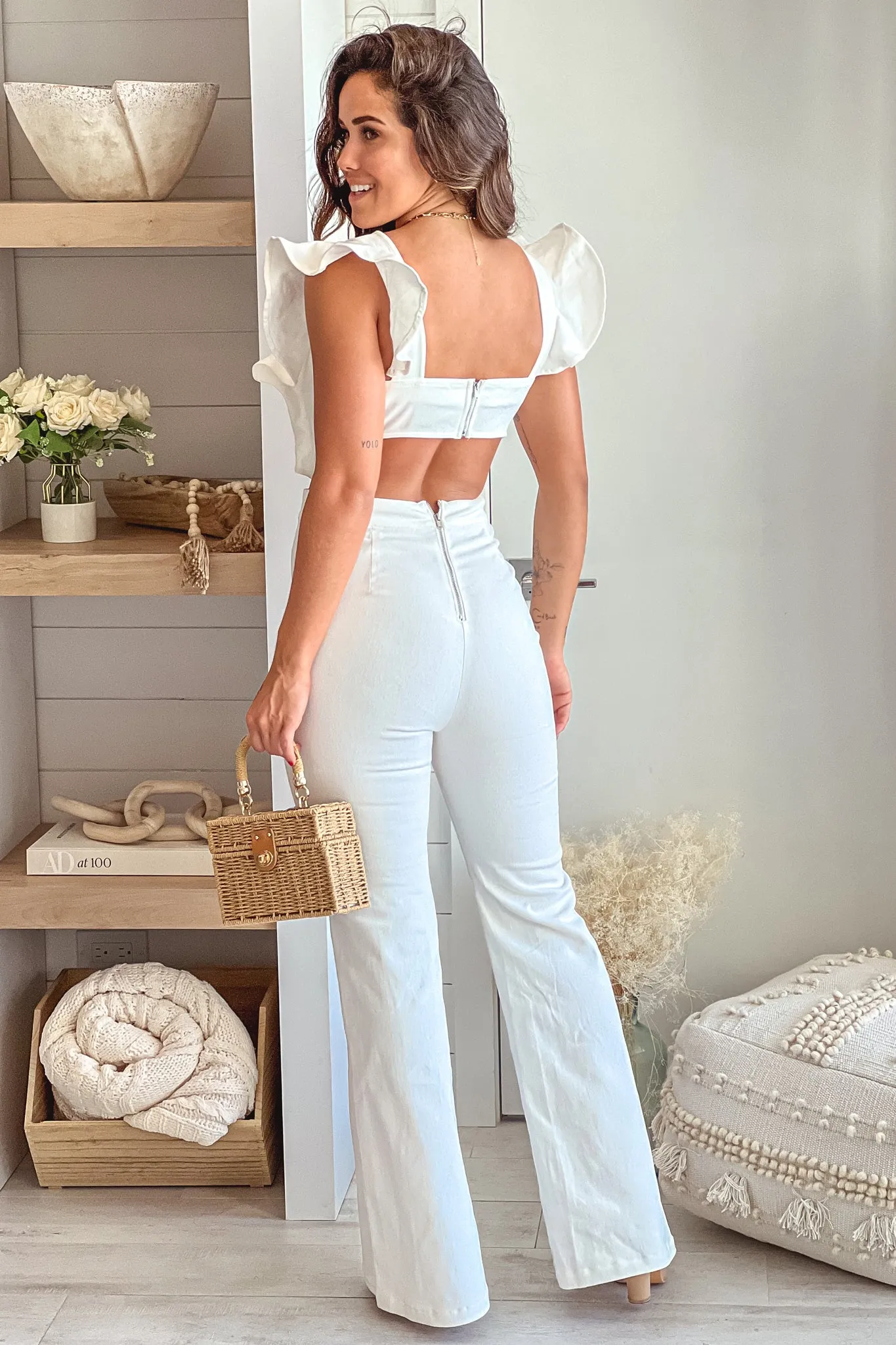 White Denim Jumpsuit With Ruffle Detail